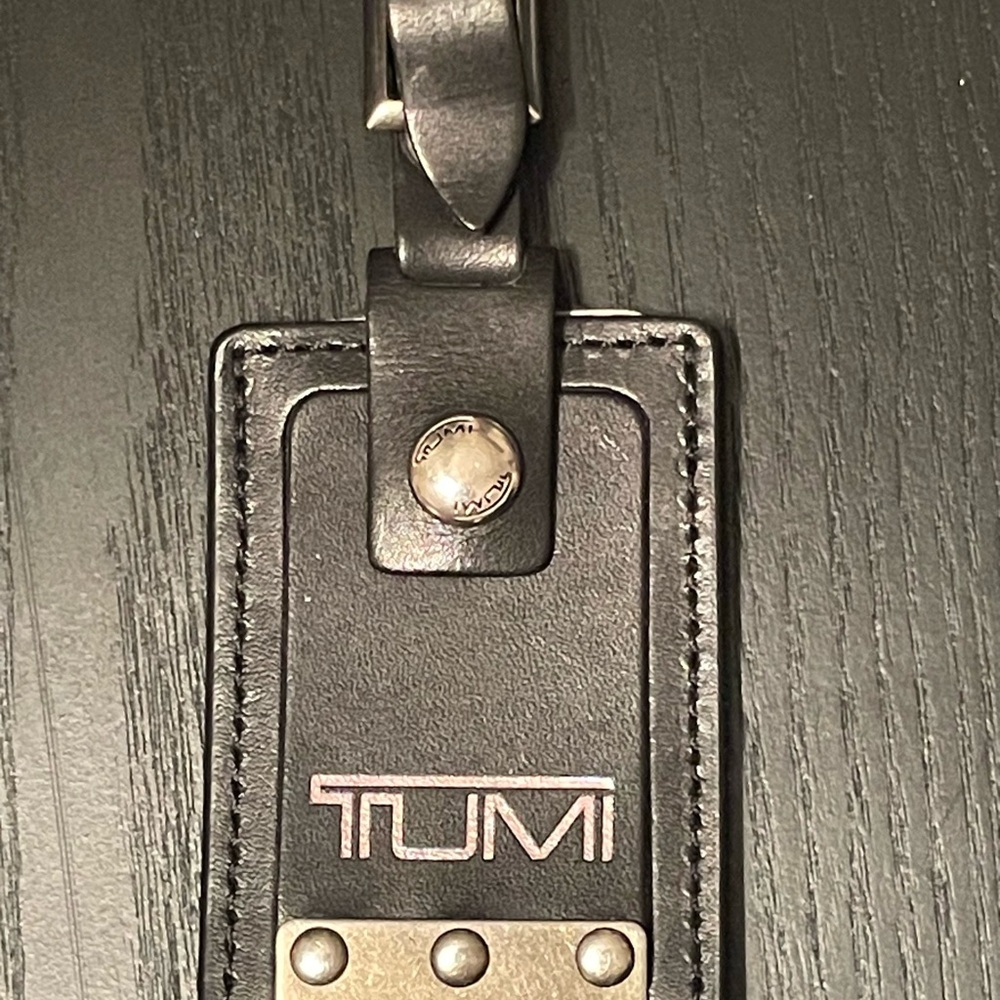 Tumi Black Leather Tag with Silver Accents